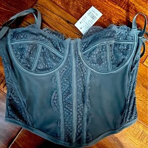 New with tags. Grey corsets. Size small. PAC sun.